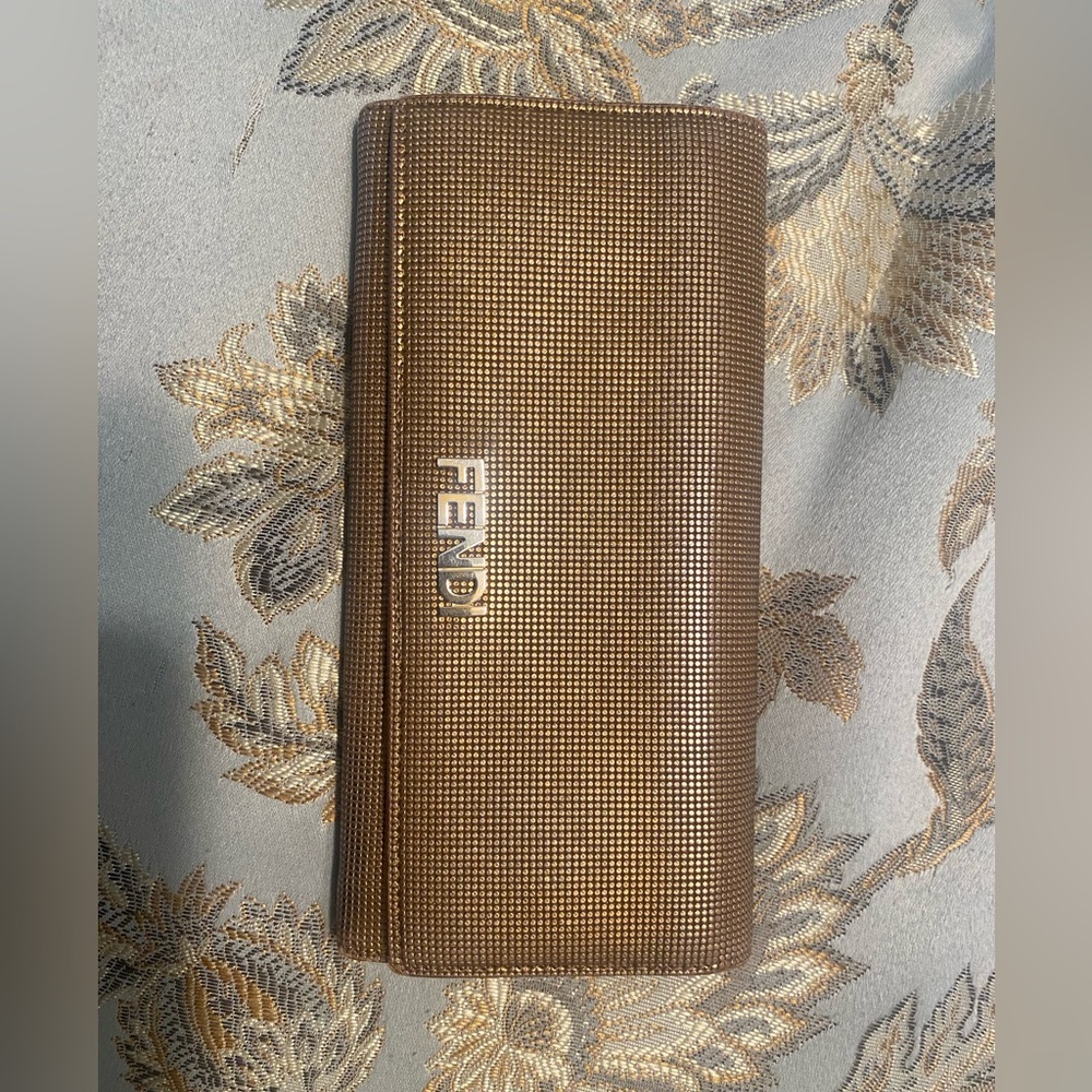 Fendi Gold leather wallet.